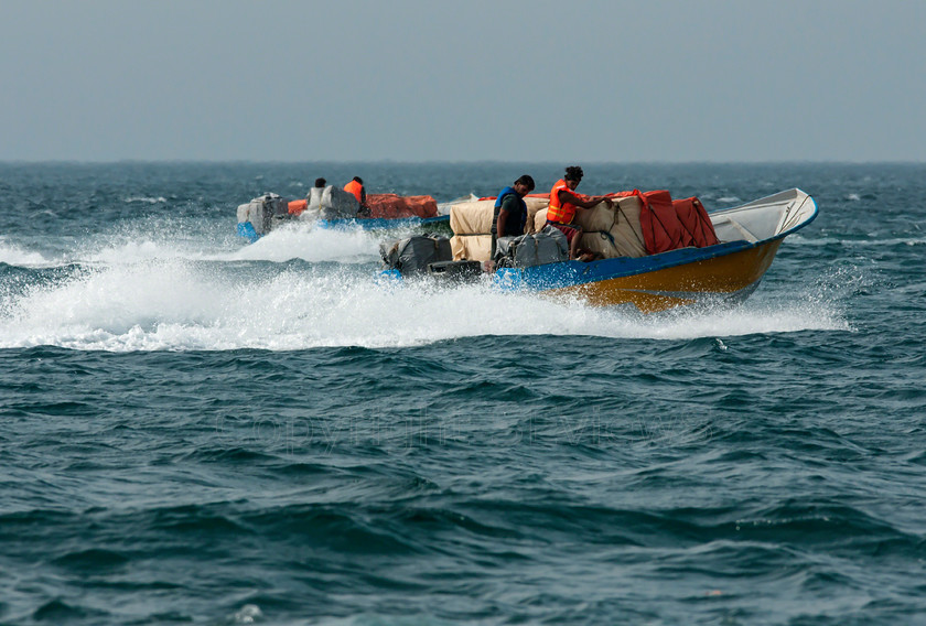 Iranian Speedboat01298 
 Speedboat Iran_UAE import export trade across Straits of Hormuz, Musandam Peninsular; Oman 
 Keywords: Speedboat, Iran, UAE, Straits of Hormuz, Musandam Peninsular, smugglers, Oman