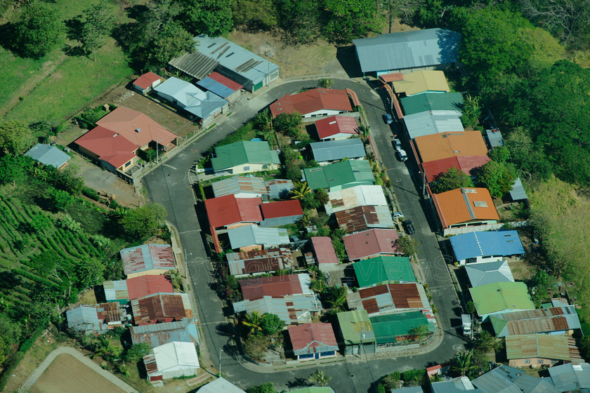 tin roofs villageDSC6672 
 Aerial view of Pacific Coast, Costa Rica 
 Keywords: Costa Rica, Pacific Coast, Aerial view, tin roofs