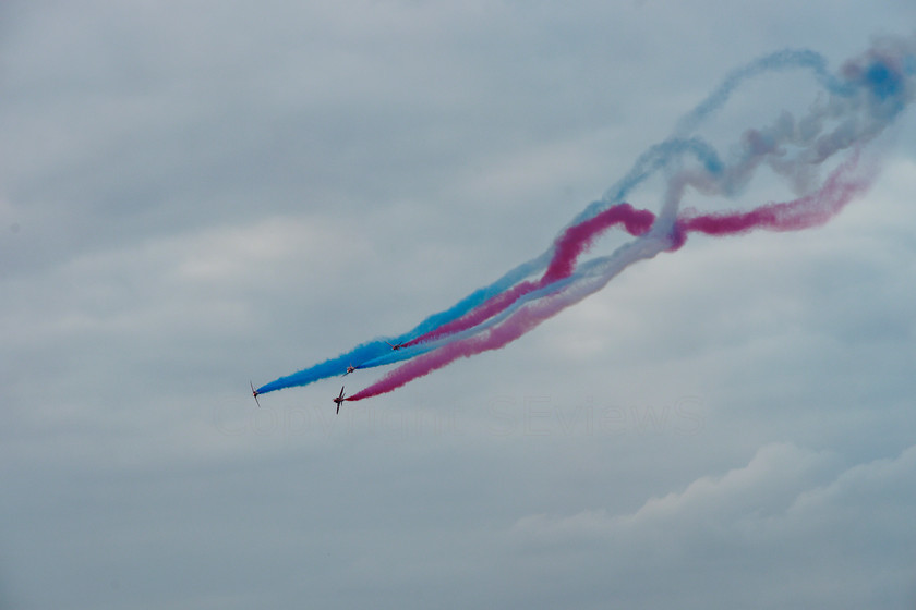 Red Arrows 0209 
 Red Arrows in action - heavy smoke trails 
 Keywords: Red Arrows, Farnborough airshow, July 2010