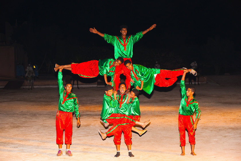 Acrobats3 
 Acrobats climbing on each other; Agadir; Morocco 
 Keywords: Acrobats, dance troop, Agadir, Morocco