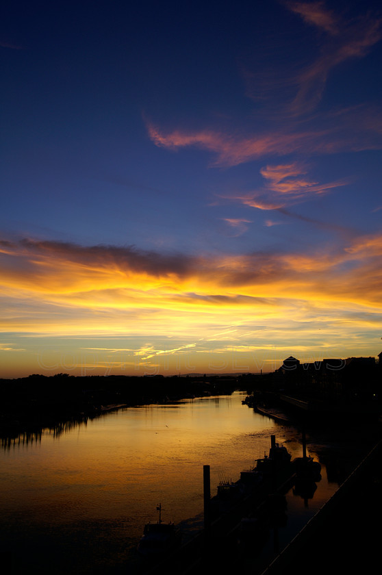 Littelhampton0017 
 Sunset over river Arun, Littlehamptopn, West Sussex 
 Keywords: Sunset, Sea, Seaside, Boat, mast, reflections, River Arun, Littlehamton, West Sussex, Arun River, Littlehampton, UK