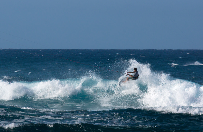 Windsurfers, Pupukea, Hawaii0811 
 Windfsurfers on Pacific Ocean waves at the end of Farrington Highway, near Dillingham Airfiled, Hawaii 
 Keywords: Windfsurfers, Pacific Coast, Farrington Highway, Near Dillingham Airfiled, Hawaii