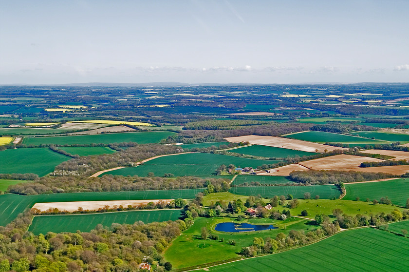 lake green fields Sussex 
 Aerial view of countryside, lake, green fields, Sussex 
 Keywords: Aerial view, green fields, lake, Sussex