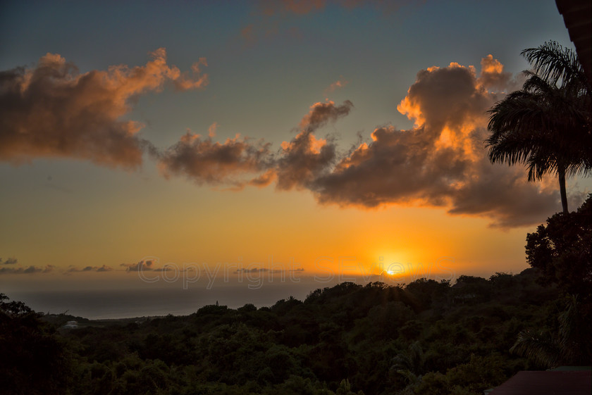 Sunset DSC0646 
 Sunset viewed from loft room, Hermitage Plantation Inn, Nevis 
 Keywords: St Kitts & Nevis, Nevis, Caribbean, Hermitage Plantation Inn: Pond Hill, sunset, Carribean sea