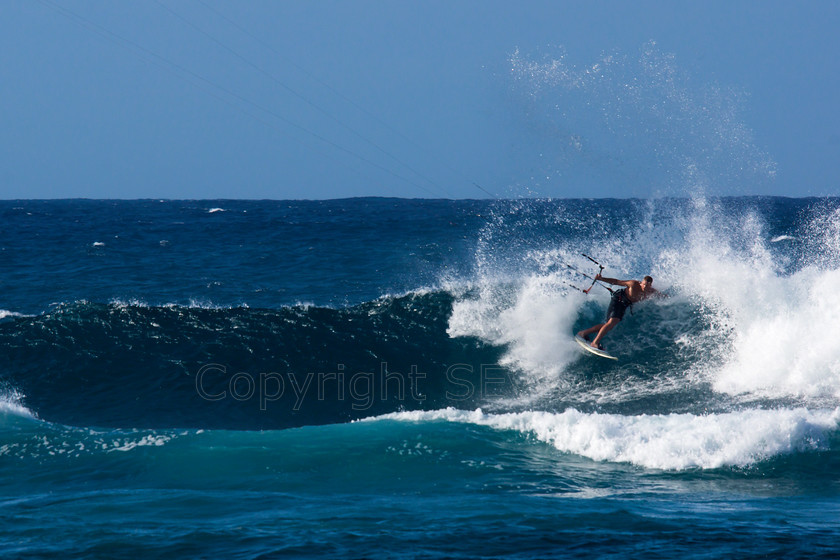 Windsurfers, Pupukea, Hawaii0727 
 Windfsurfers on Pacific Ocean waves at the end of Farrington Highway, near Dillingham Airfiled, Hawaii 
 Keywords: Windfsurfers, Pacific Coast, Farrington Highway, Near Dillingham Airfiled, Hawaii