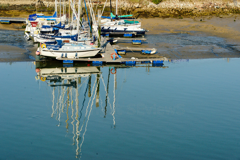 Arun River Reflections3393 
 SONY DSC 
 Keywords: Sea, Seaside, Boat, mast, reflections, River Arun, Littlehamton, West Sussex