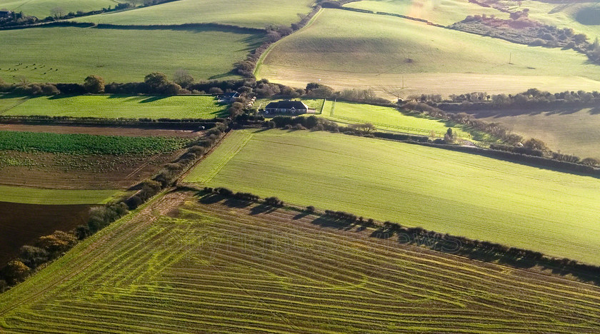 Arial View Sussex (26) 
 Arial View of fields, Sussex 
 Keywords: Arial View, Sussex, mustard seed yellow flower fields airfield, Isle of White