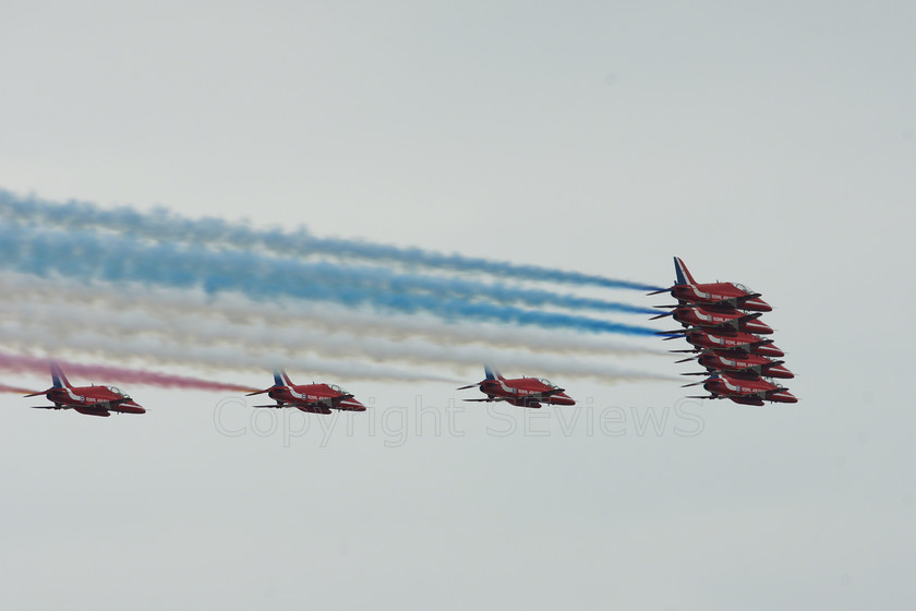 Red Arrows 02717 
 Red Arrows in action 
 Keywords: Red Arrows, Farnborough airshow, July 2010