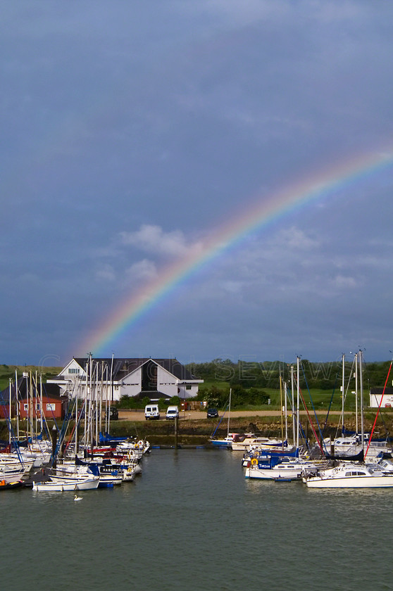 Rainbow Arun Golf Club house 
 Rainbow over Arun Golf Club house, River Arun, Littlehampton, West Sussex 
 Keywords: Rainbow, River Arun, Sunset, Reflections, Sky, Clouds, Littlehampton, West Sussex