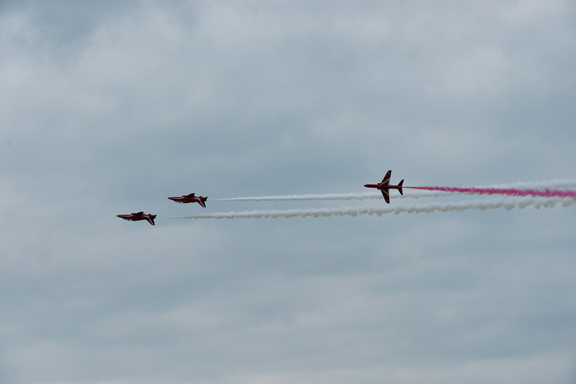 Red Arrows 0192 
 Red Arrows in action - in line flip over, some up side down 
 Keywords: Red Arrows, Farnborough airshow, July 2010