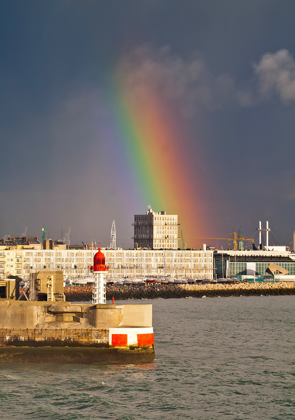 Le Havre harbour, lighthouse & rainbow 
 Harbour, lighthouse & Rainbow, Le Havre, France 
 Keywords: Harbour, lighthouse, Rainbow, storm clouds, Le Havre, France