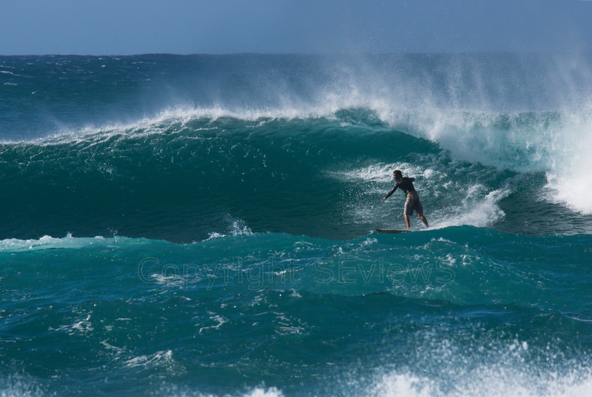 Windsurfers, Pupukea, Hawaii0605 
 Surfers on Sunset Beach Neighborhood Park, Hoalua Stree, Pupukea, Hawaii 
 Keywords: Pacific Ocean, waves, Surfers, Sunset Beach Neighborhood Park, Hoalua Street, Pupukea, Hawaii