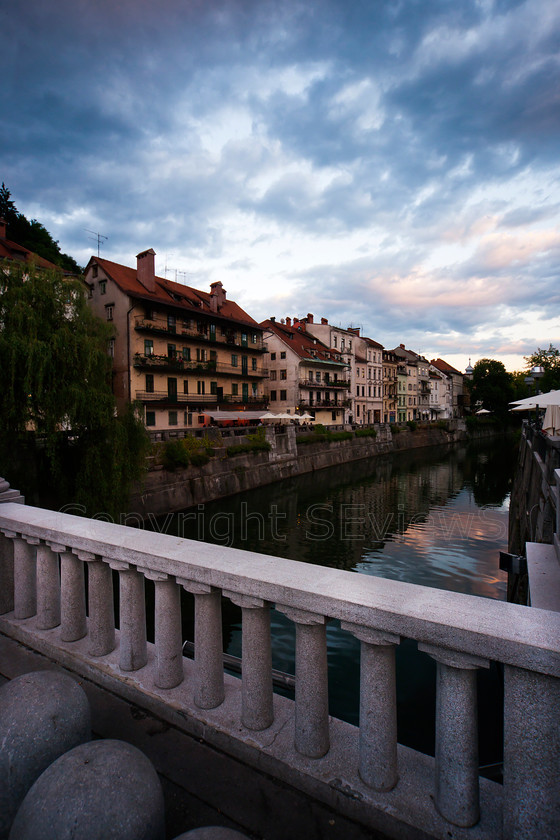 Bridge Ljubljanica 
 Bridge over river Ljubljanica at sunset in Ljubljana 
 Keywords: Bridge, Ljubljana, river Ljubljanica, sunset, clouds, Slovenia, EU