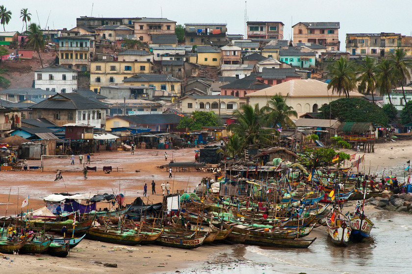 fishing boats Elmina2 
 Beach and wooden fishing boats at Elmina fishing harbour near Cape Coast, Ghana, West Africa 
 Keywords: Fishing boats, town, beach, Fishing harbour, Elmina, Cape Coast, Ghana, West Africa