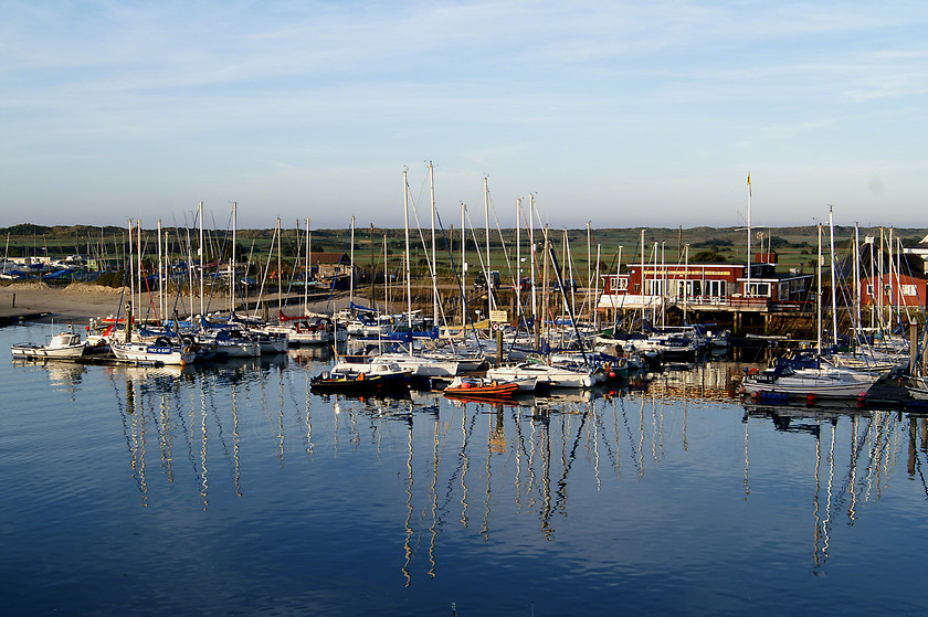 Mast reflections 
 Arun Yacht club mast reflections on Arun River at sunrise, Littlehampton, West Sussex 
 Keywords: Arun River, Sea, Seaside, Boat, mast, reflections, River Arun, Sunrise, Littlehampton, West Sussex