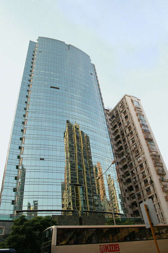 Sing buildings0050 
 Building reflection on glass clad high rise buiding, Singapore 
 Keywords: Singapore, glass clad, reflection