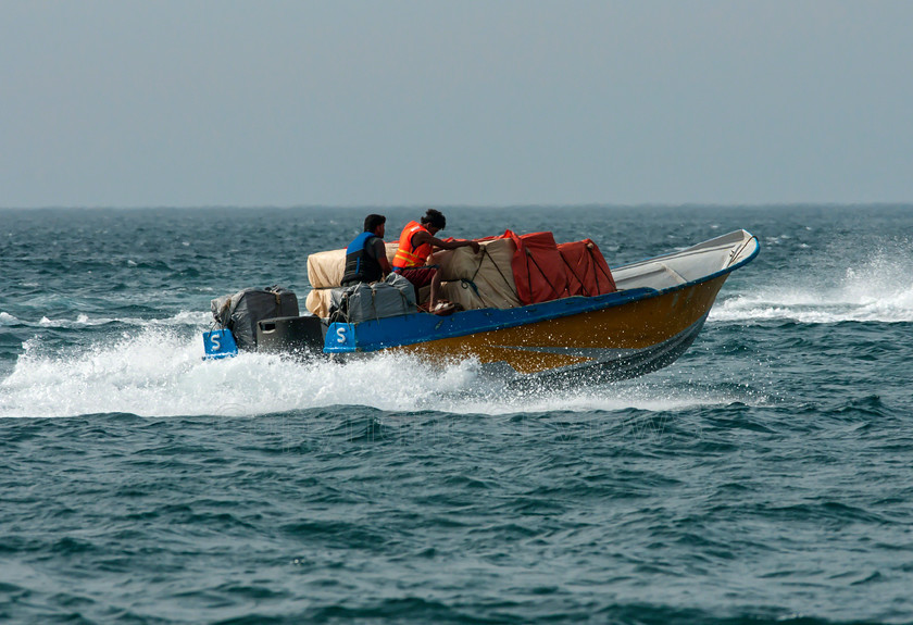 Iranian Speedboat01297 
 Speedboat Iran_UAE import export trade across Straits of Hormuz, Musandam Peninsular; Oman 
 Keywords: Speedboat, Iran, UAE, Straits of Hormuz, Musandam Peninsular, smugglers, Oman