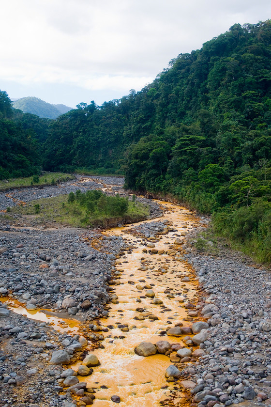 rusty river, 
 SONY DSC 
 Keywords: Two rivers, yellow, clear water, Costa Rica, Central America, Pacific Coast