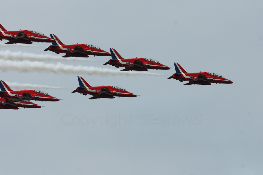 Red Arrows 02253 
 Red Arrows in action, tight horizontal arrow formation 
 Keywords: Red Arrows, Farnborough airshow, July 2010